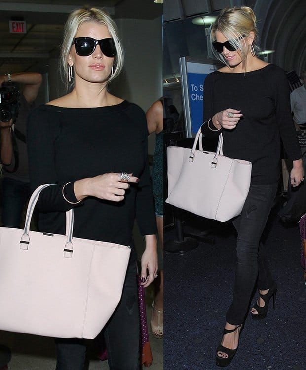 Jessica Simpson totes a Victoria Beckham “Liberty” tote at LAX