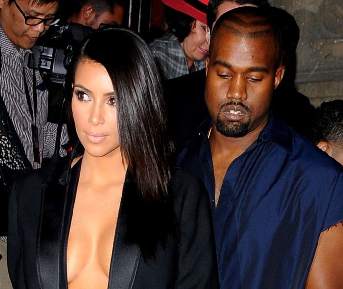 Kim Kardashian and Kanye West leaving the presentation of Lanvin's Spring/Summer 2015 ready-to-wear fashion collection, presented in Paris, France, on September 25, 2014