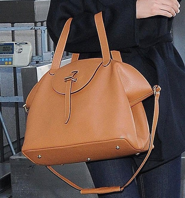 Lily Aldridge carrying a large Meli Melo Thela bag