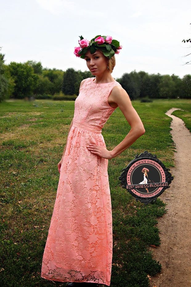 Marina wears one of the loveliest pink lace dresses ever