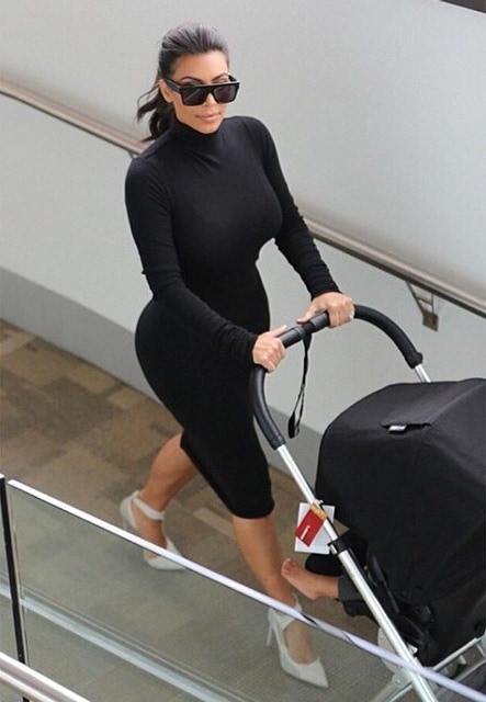 Shared by Kim Kardashian on September 11, 2014, with the caption "Mommy Swag- Rick Owens dress, Balenciaga heels, Céline sunnies"