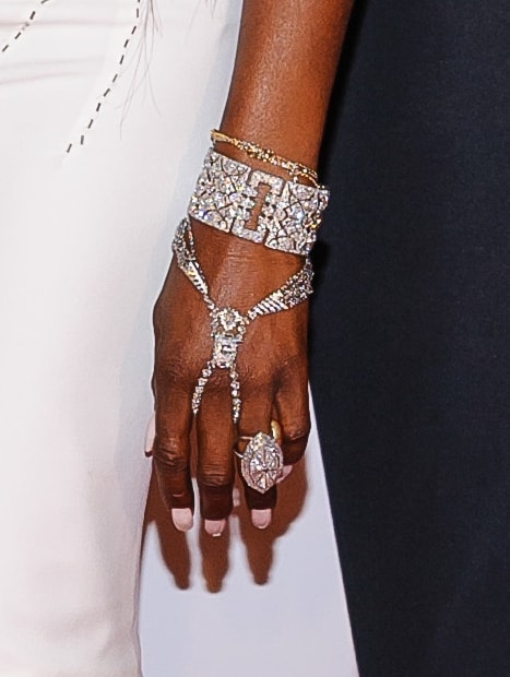 Naomi Campbell shows off her crystal-embellished hand bracelet