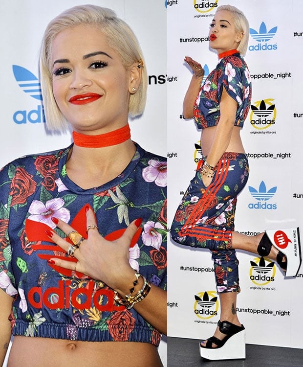 Rita Ora flaunts her flat abs in a floral crop top and matching pants