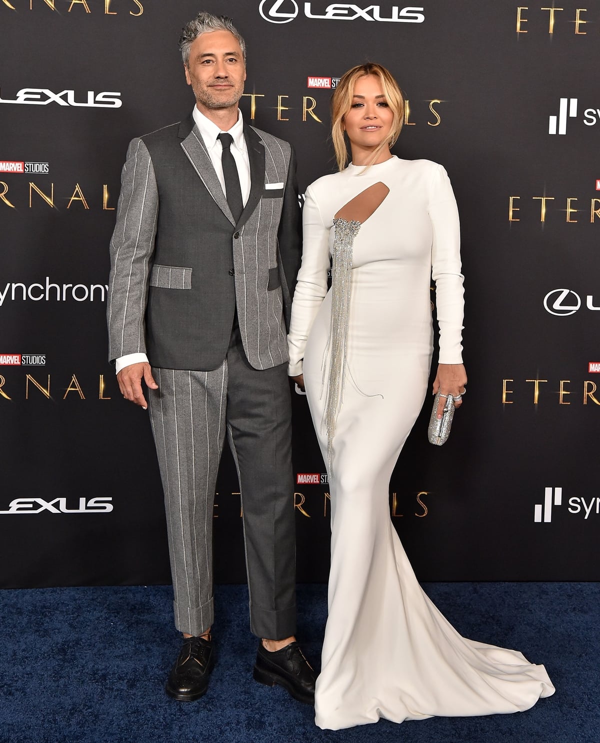 Rita Ora in a Stephane Rolland dress with her boyfriend Taika Waititi at the premiere of Marvel’s Eternals