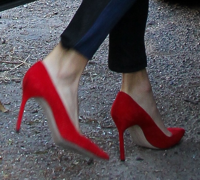 Nikki Reed wearing red hot stilettos