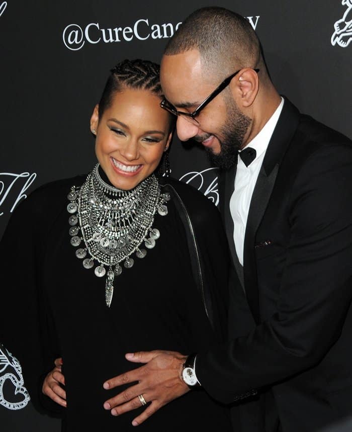 Pregnant Alicia Keys in an off-the-shoulder black Givenchy Couture gown