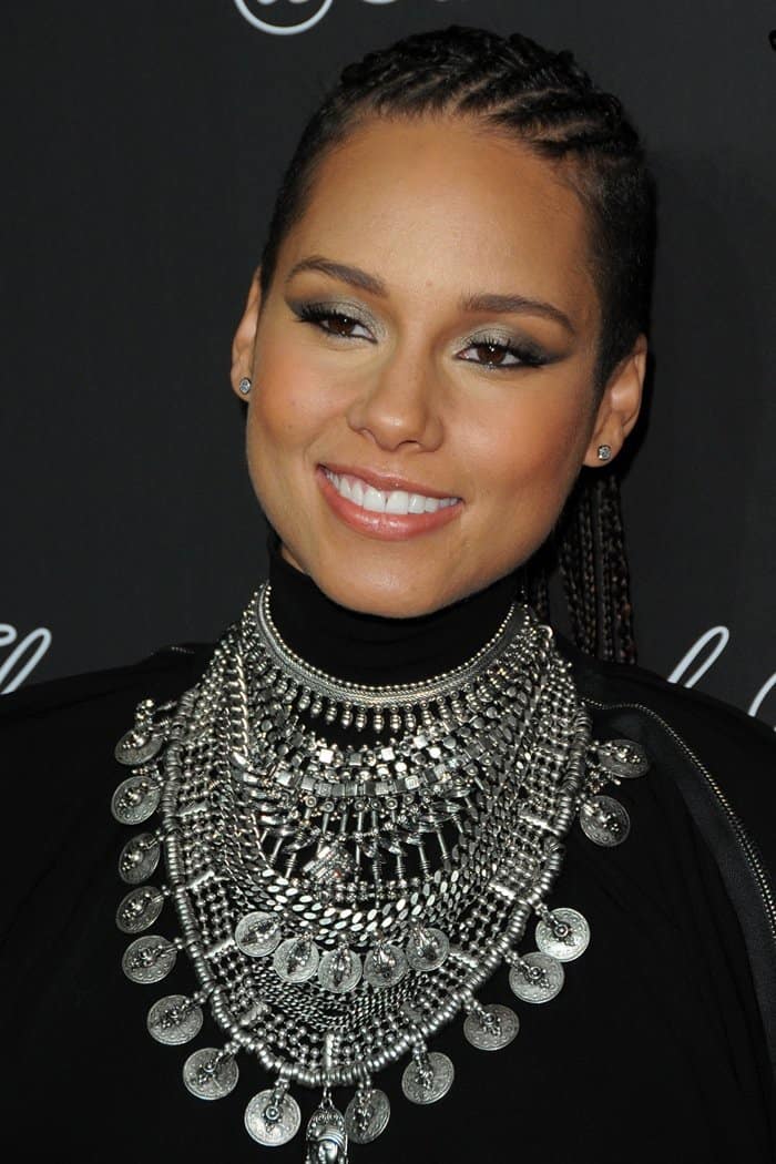 Alicia Keys styled her black maternity dress with a silver coin-embellished statement necklace