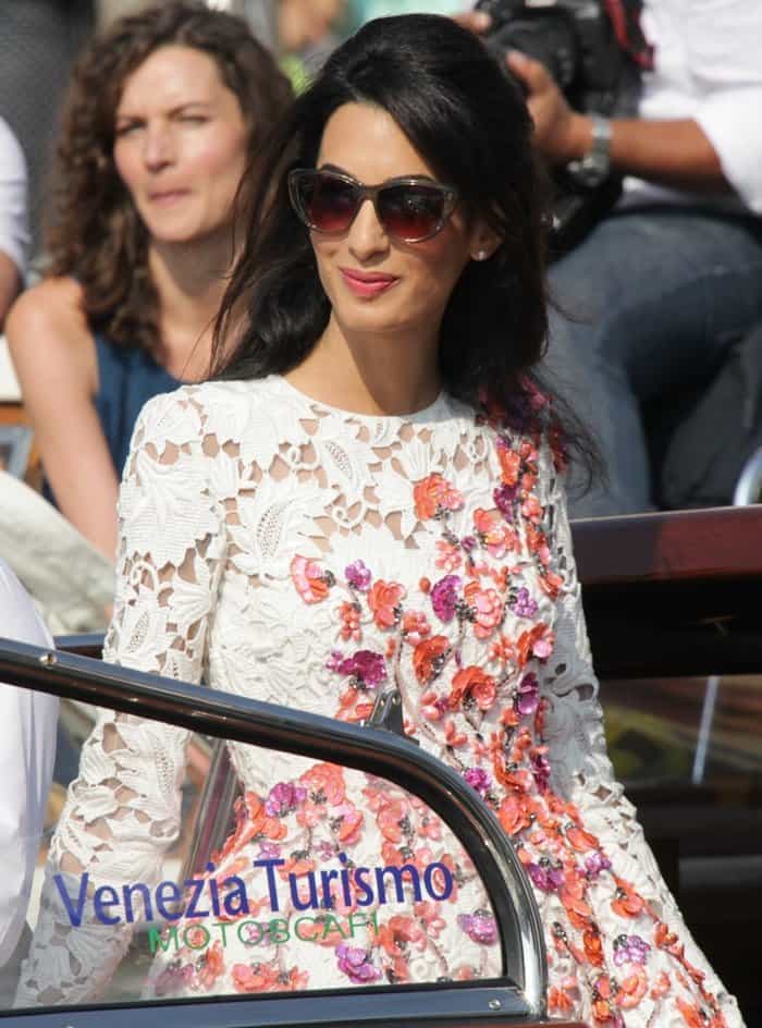 Amal Alamuddin radiates elegance in her floral Giambattista Valli dress while enjoying the Venice sunshine