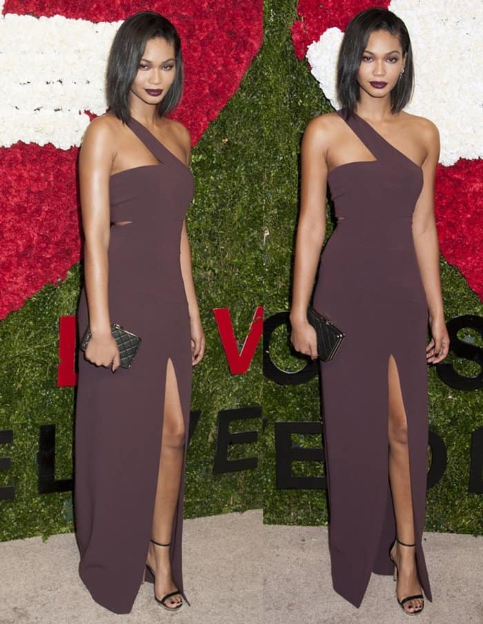 Chanel Iman stood out with her elegant Bordeaux asymmetrical gown paired with Doris sandals and a MICHAEL Michael Kors Elsie clutch