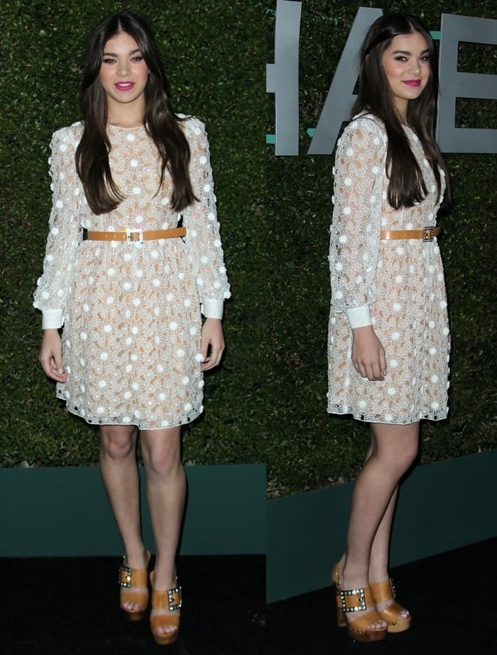 Hailee Steinfeld wore a lace dress from the the Michael Kors Resort 2015 collection and tan accessories from the Kors collection