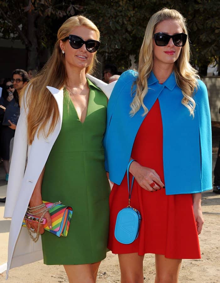 Paris Hilton and Nicky Hilton stun in vibrant, colorblocked Valentino outfits at Paris Fashion Week Spring/Summer 2015