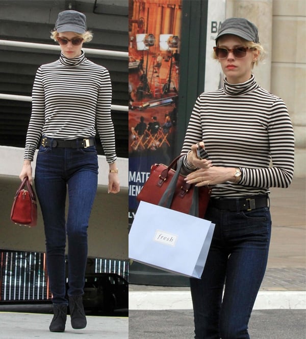 January Jones wearing a striped top with high-waisted pants