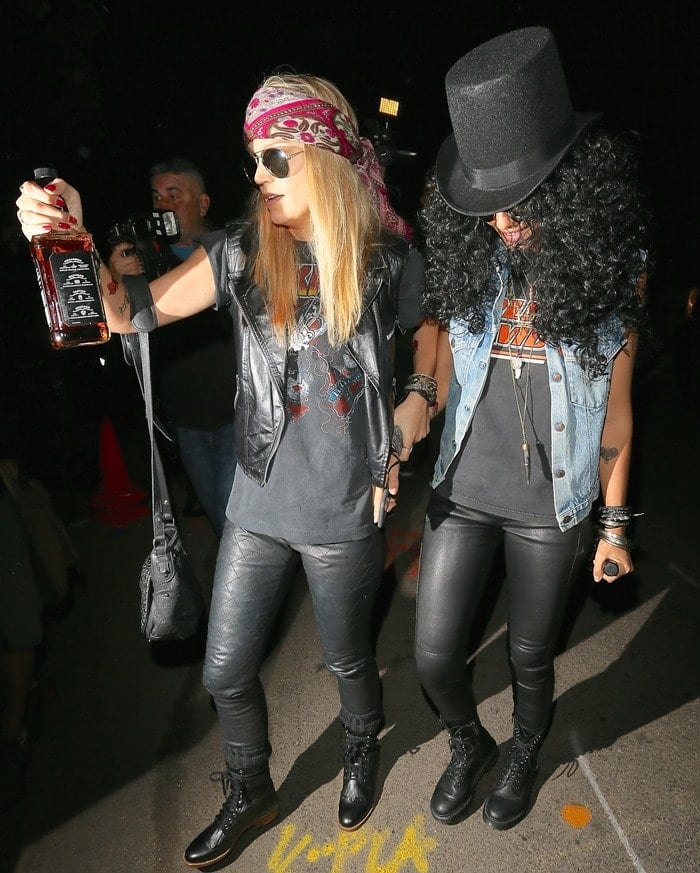 Jessica Alba dressed as Slash and Kelly Sawyer as Axl Rose for Halloween