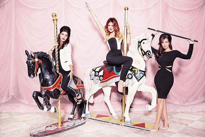 The Kardashian sisters striking fierce poses on carousel horses