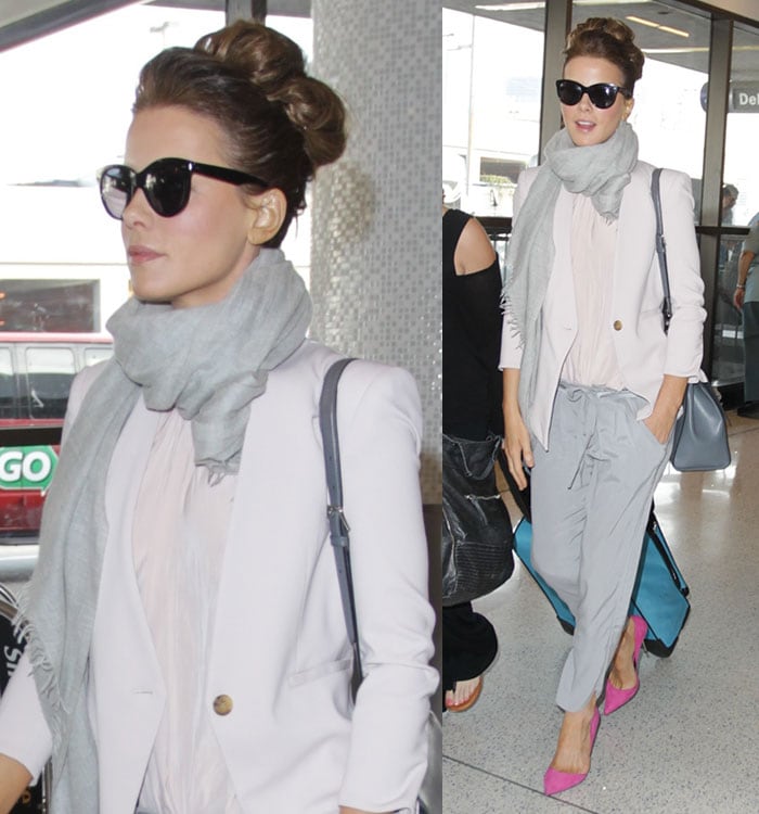 Kate Beckinsale wearing gray silk drawstring pants at LAX on October 13, 2014