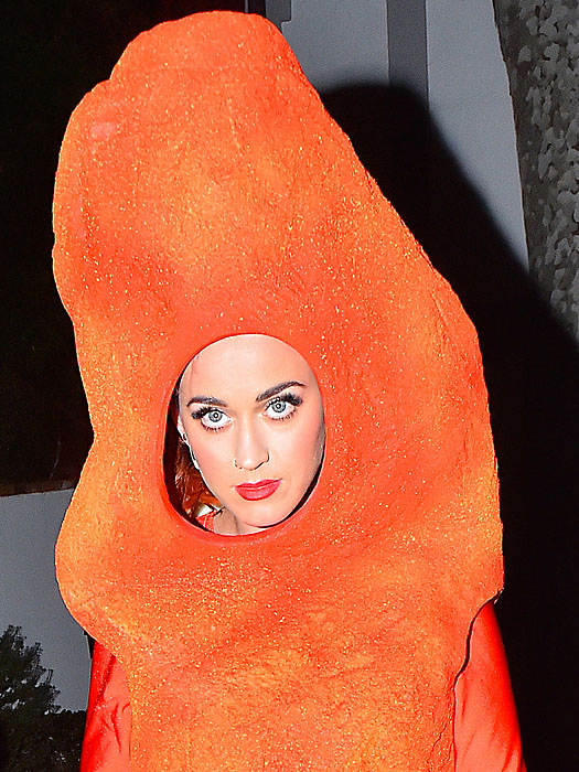 Katy Perry sporting orange hair in her Cheetos Halloween costume