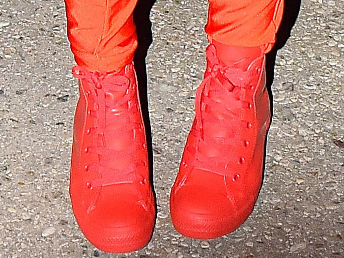 Katy Perry wearing Chuck Taylor All Stars waterproof rubber rain sneakers