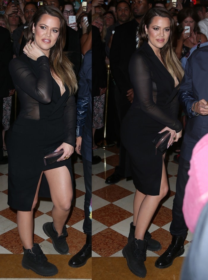 Khloe Kardashian in a black tuxedo dress paired with Timberland work boots and a Jennifer Zeuner star necklace