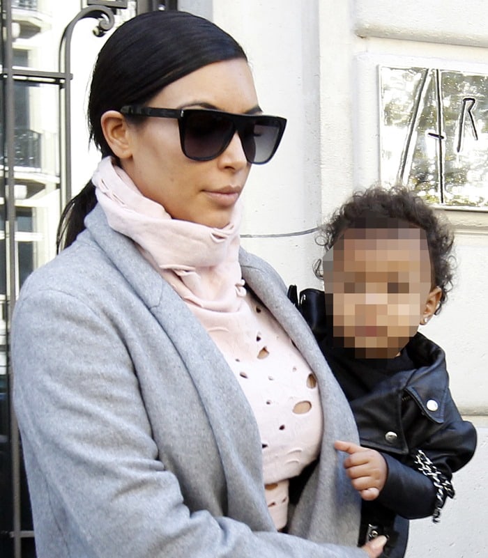 Kim Kardashian and Noah exiting the Royal Monceau Hotel in Paris