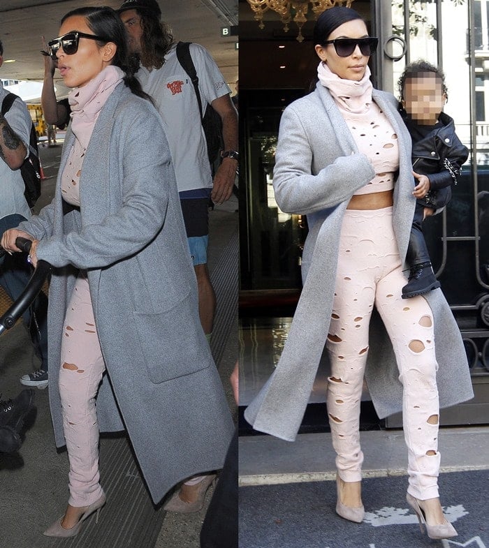 Kim Kardashian opted for a pair of Chanel Fall 2014 joggers and a matching crop top, but what set this outfit apart was the fact that it was entirely covered with holes