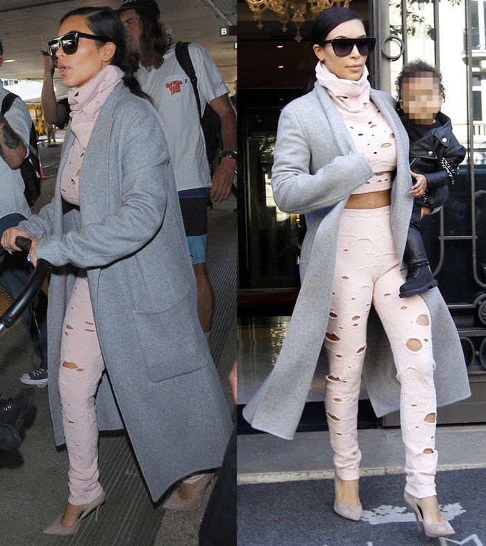 Kim Kardashian opted for a pair of Chanel Fall 2014 joggers and a matching crop top, but what set this outfit apart was the fact that it was entirely covered with holes