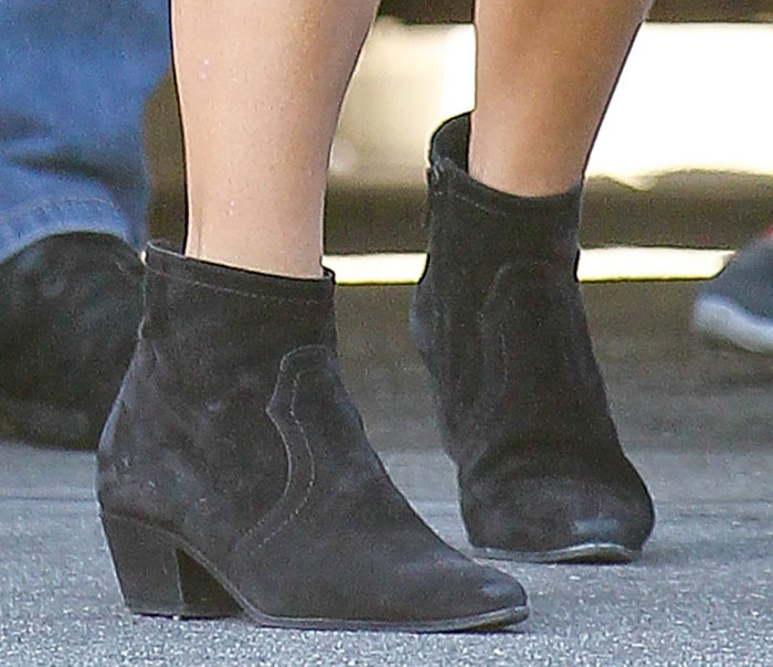Kourtney Kardashian in ankle boots that gave off a city cowgirl vibe