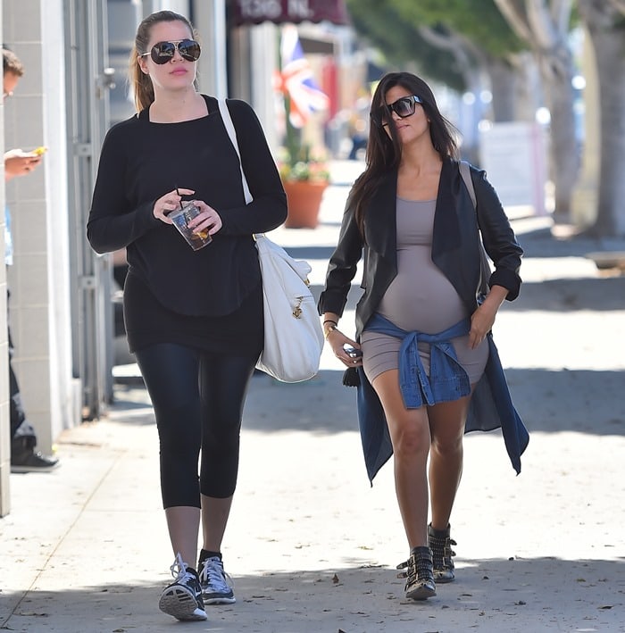 Kourtney Kardashian and Khloe Kardashian seen leaving Gemini G.E.L. in Los Angeles on September 24, 2014