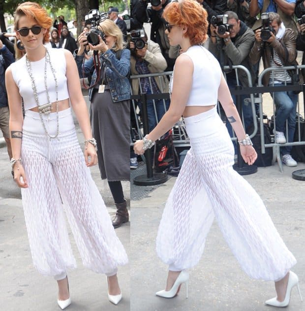 Kristen Stewart's sheer palazzo pants and crop top at Paris Fashion Week look like they were borrowed from a futuristic genie