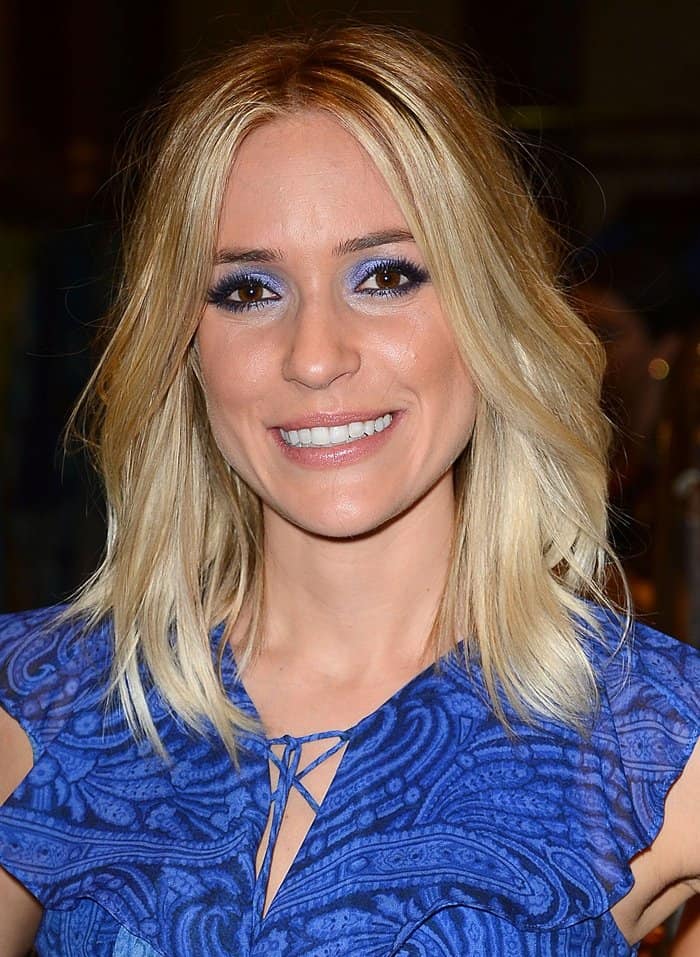 Kristin Cavallari wears her blonde hair in loose, tousled waves with a center part