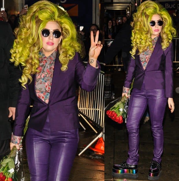 Lady Gaga’s look at Roseland Ballroom combines neon green hair, a purple suit, and platform shoes, resembling a psychedelic fashion experiment