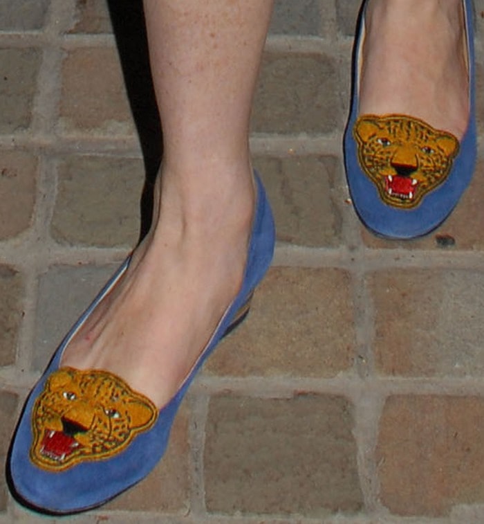 Lindsay Lohan's blue mascot-embroidered suede pumps