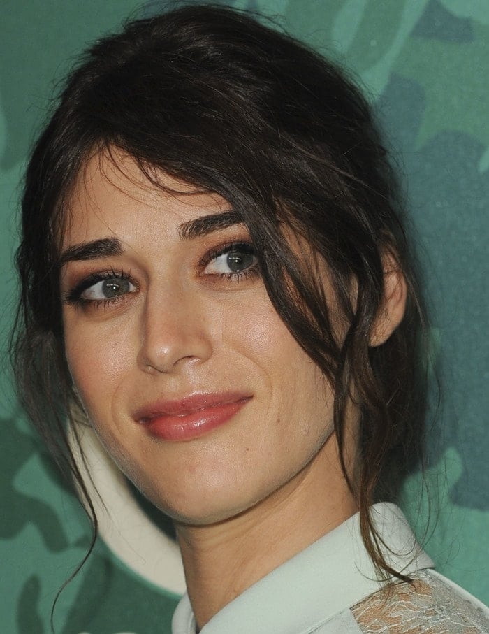 Lizzy Caplan's mint green lace-paneled and collared dress