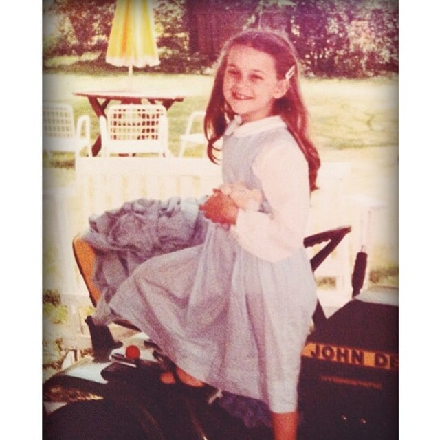 Photo shared by Reese on Instagram with the caption "Because what Southern girl doesn't love a John Deere tractor.. #TBT" - posted on October 2, 2014