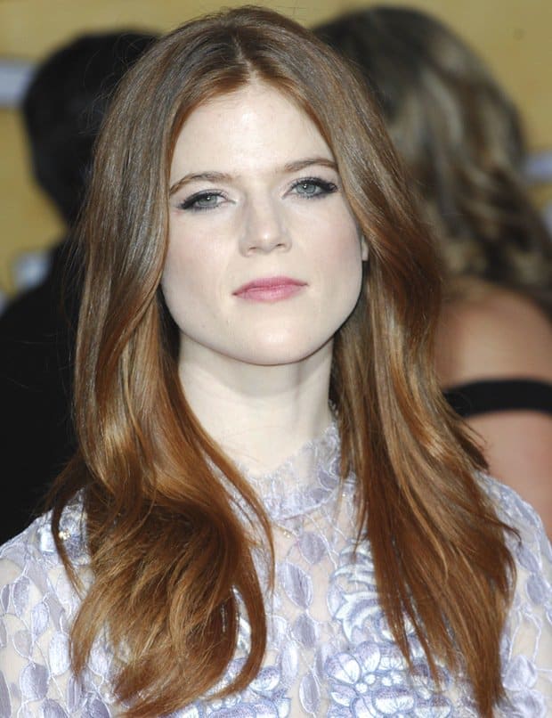 Rose Leslie's floral lace top is a fashion statement that says 'doily chic' at the 20th Annual Screen Actors Guild Awards