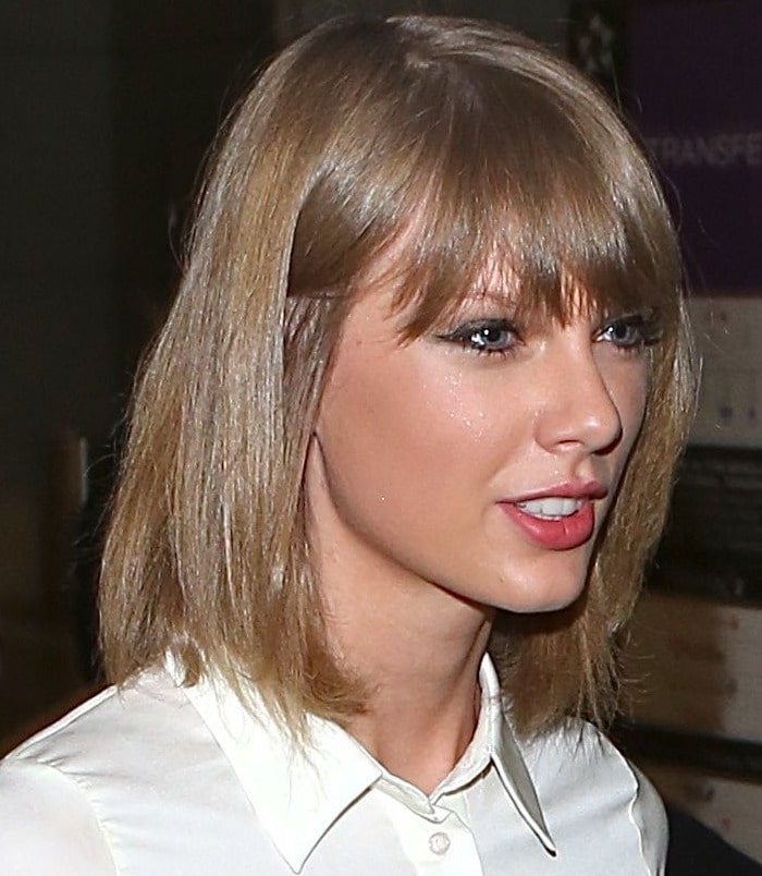 Taylor Swift sported a "Flitter Flutter" shirt by Miss Patina