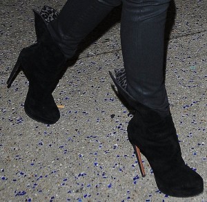 Victoria Beckham Carries Daughter in Azzedine Alaïa Sky-High Ankle Boots