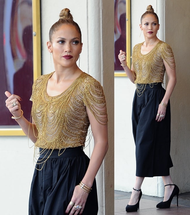 Jennifer Lopez looked like a flapper girl in gold-fringed shirt and cropped wide-leg pants