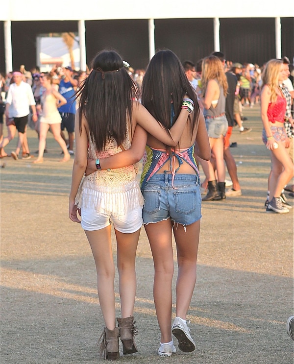 The sisters both wore knit tanks with their shorts. Victoria wore fringed ankle booties while her sister stuck to a comfy pair of sneakers