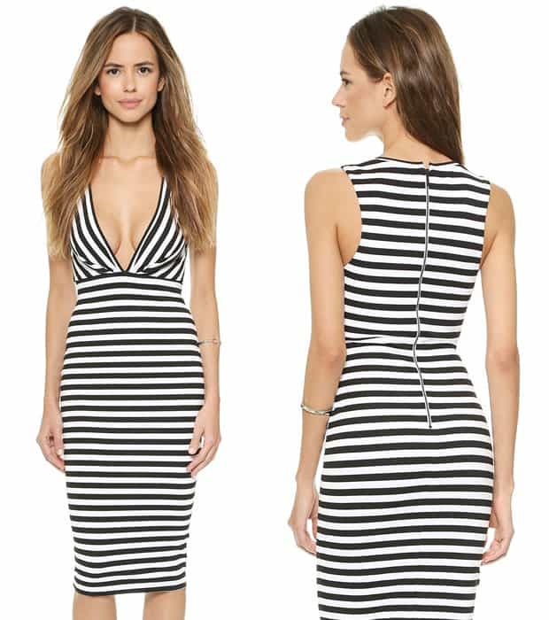 A form-fitting Bec & Bridge dress with a pleated bodice and plunging neckline