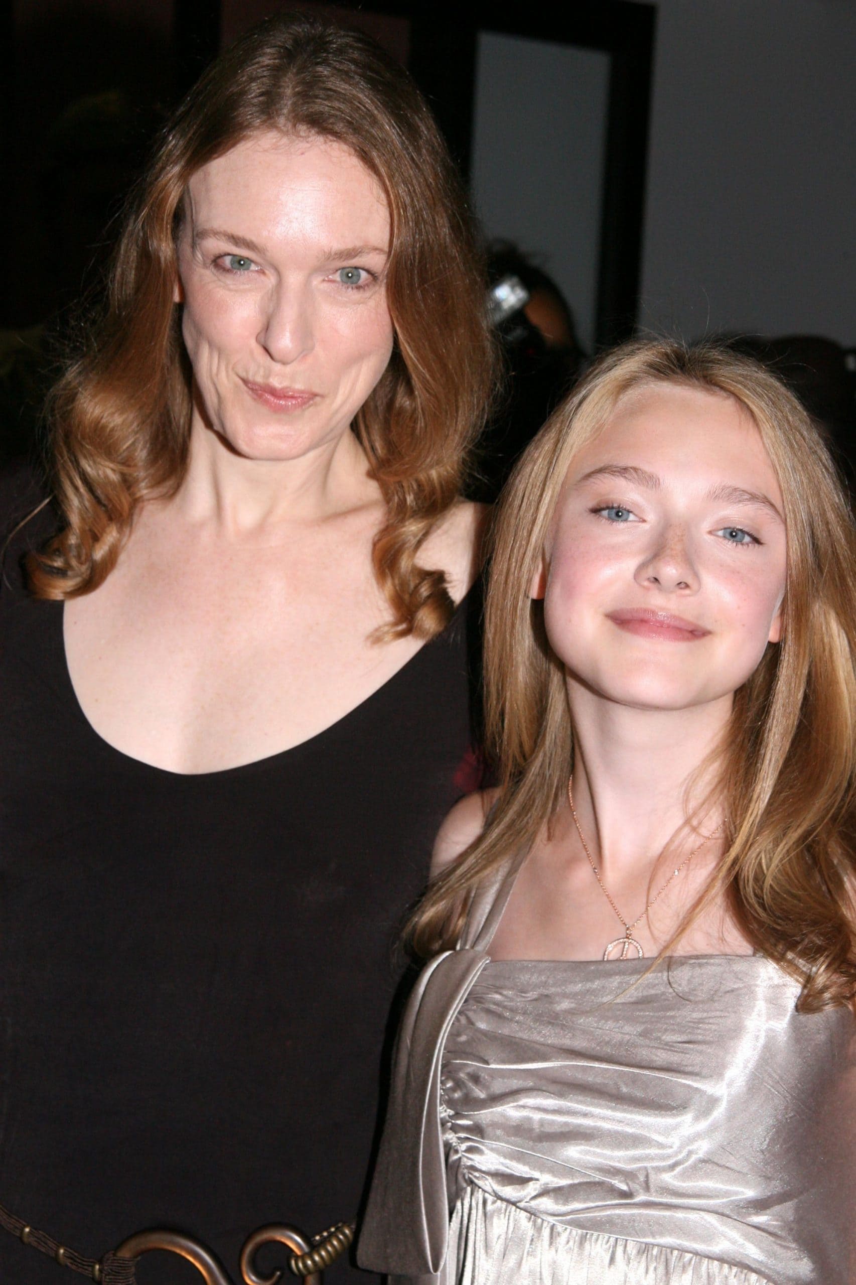 Dakota Fanning poses with director Deborah Kampmeier at the premiere of Hounddog