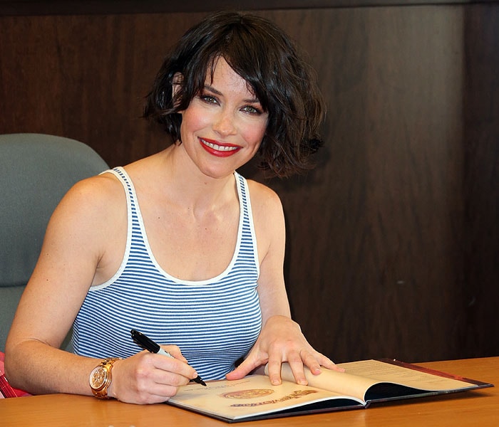 Evangeline Lilly signing copies of her book, The Squickerwonkers