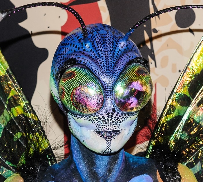 Heidi Klum with large fly eyes and feelers attached to her head at the 15th Annual Halloween Party