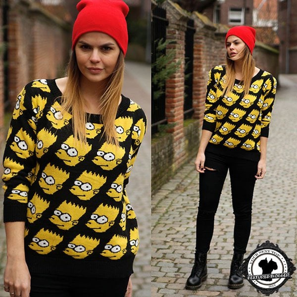 Iris wears an adorable Bart Simpson print sweater with a bright red beanie