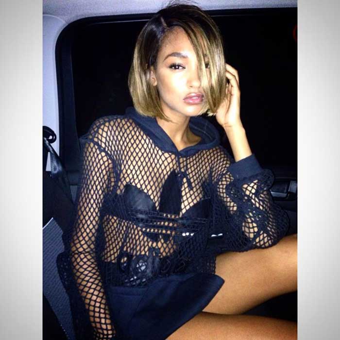 Jourdan Dunn covers her breasts with the Adidas logo at the Red Bull Culture Clash event