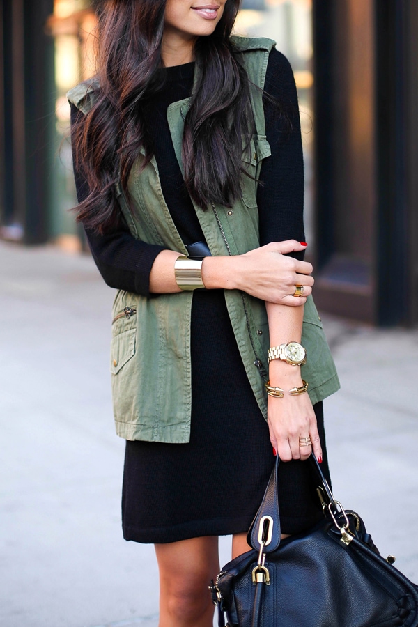 Kat styled her vest with a little black dress, a fedora, and animal print shoes