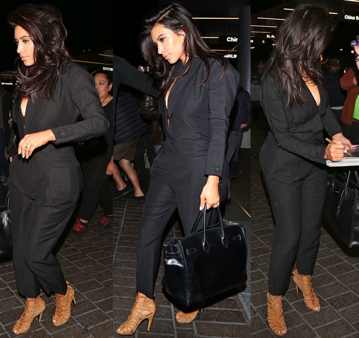 Kim Kardashian toting a black Hermes bag