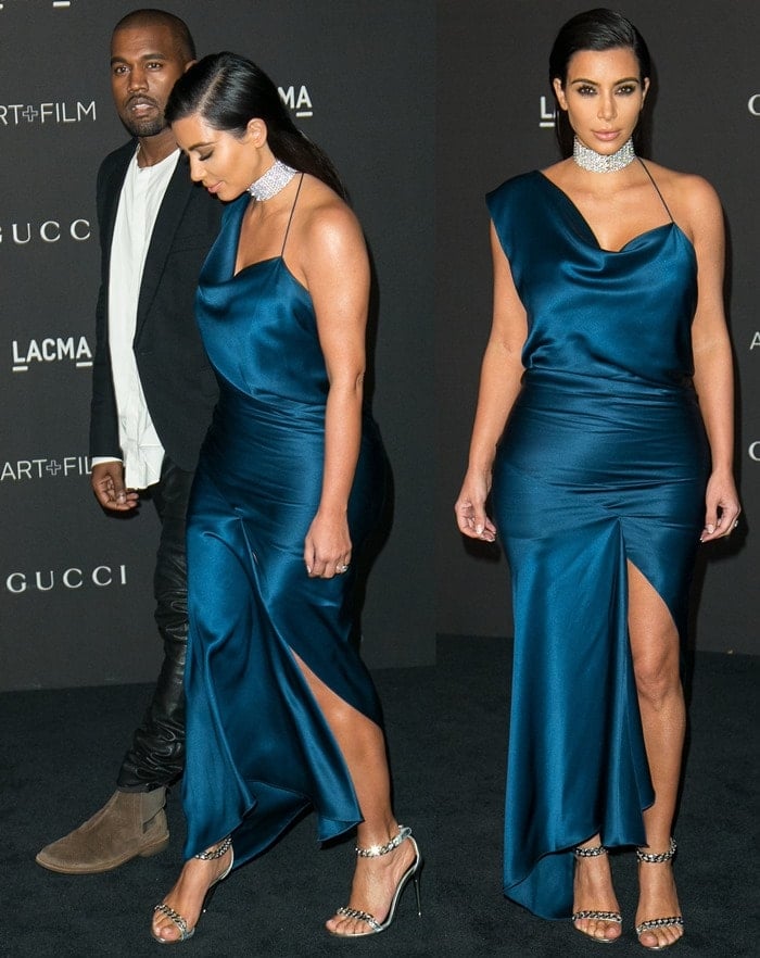 Kim Kardashian showed some leg in an ill-fitting midnight blue gown