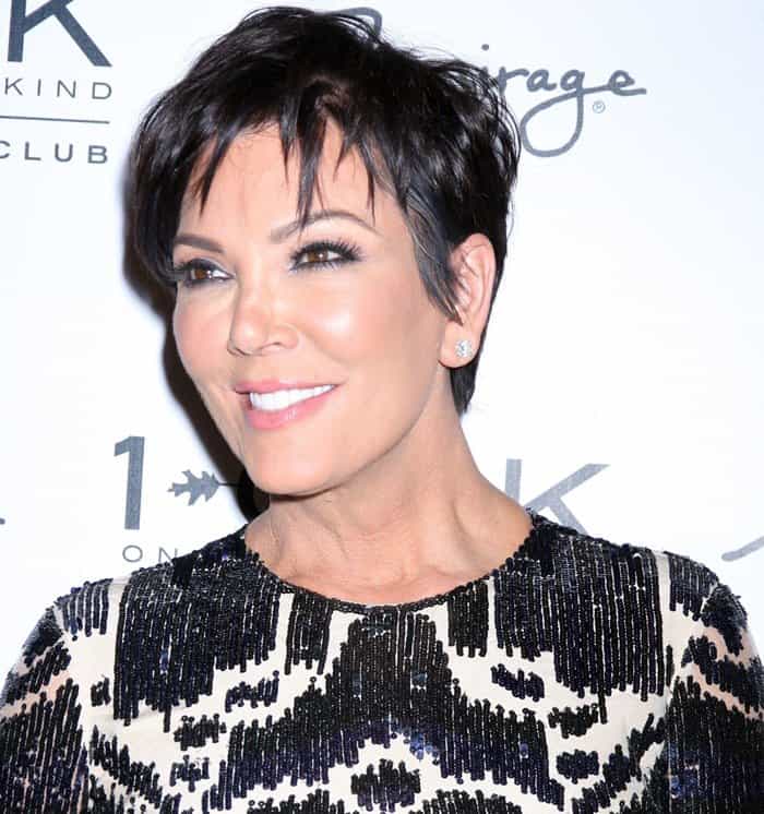 Kris Jenner flashes her bright, white smile and perfectly styled pixie cut while celebrating her 59th birthday at 1 OAK Nightclub in Las Vegas