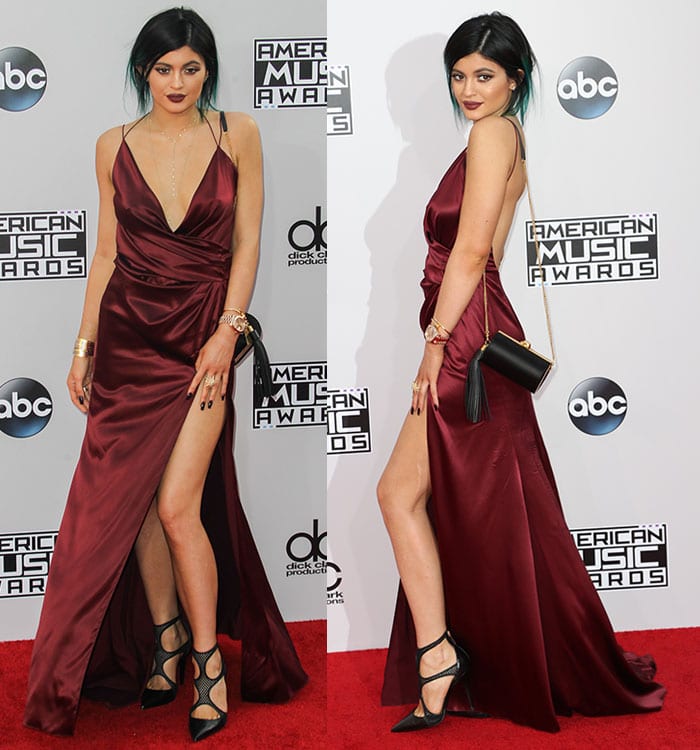 Kylie Jenner flaunts her legs in an oxblood satin gown from Alexandre Vauthier’s Spring 2014 collection