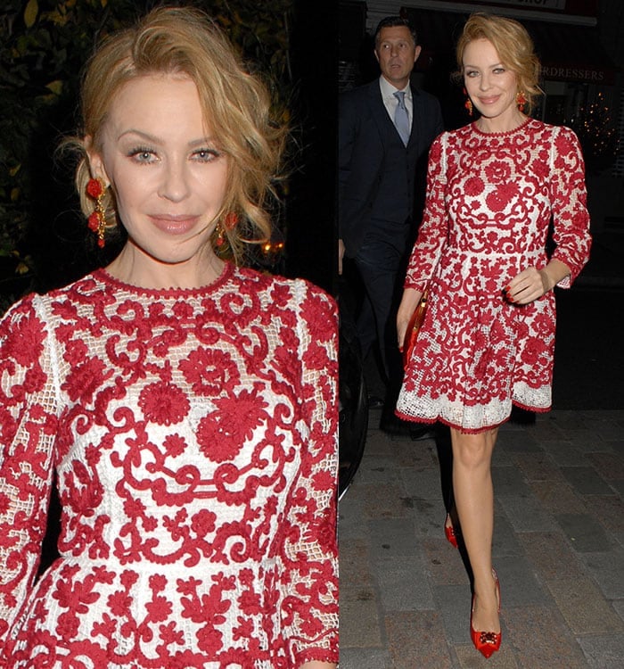 Kylie Minogue completed her hot Mrs. Claus look with red nails, a red silk clutch, statement red earrings, and bright red pumps